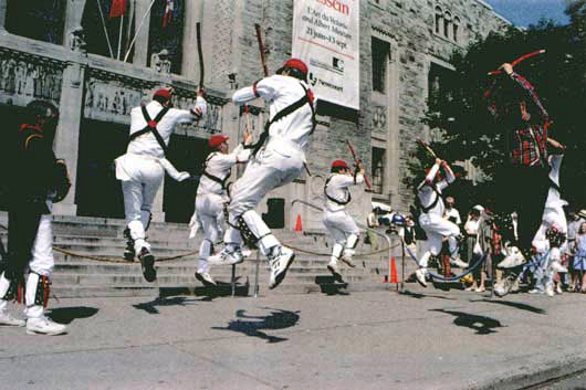 The Morris Men dancing in front of the Royal Ontario Museum